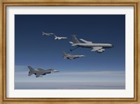Framed Four F-16's and a KC-135 Fly in Formation over Arizona