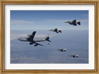 Framed Four F-16's and a KC-135 over Arizona