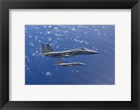 Framed Two F-15 Eagles over the Pacific Ocean