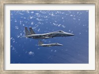Framed Two F-15 Eagles over the Pacific Ocean