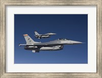 Framed Two F-16's in a Blue Sky