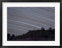 Framed Star Trails over a cross in Oklahoma