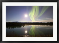 Framed Aurora Borealis with Full Moon over the Yukon River in Canada