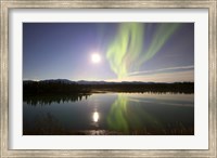 Framed Aurora Borealis with Full Moon over the Yukon River in Canada