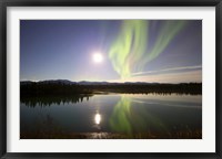 Framed Aurora Borealis with Full Moon over the Yukon River in Canada