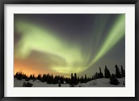 Framed Aurora borealis over Ogilvie Mountains