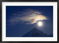 Framed Full Moon with Rainbow Clouds at Ogilvie Mountains