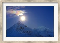 Framed Full moon with Rainbow Clouds over Ogilvie Mountains, Canada