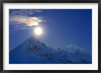 Framed Full moon with Rainbow Clouds over Ogilvie Mountains, Canada