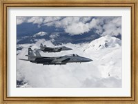 Framed Two F-15 Eagles Fly Past Snow Capped Peaks in Central Oregon