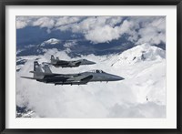 Framed Two F-15 Eagles Fly Past Snow Capped Peaks in Central Oregon