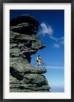 Framed Mountain Biker and Rock Tor, Dunstan Mountains, Central Otago