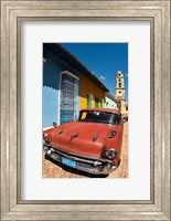 Framed Old Classic Chevy on cobblestone street of Trinidad, Cuba