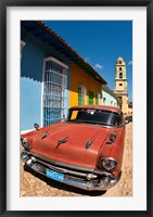 Framed Old Classic Chevy on cobblestone street of Trinidad, Cuba
