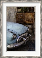 Framed Front of 1950's era car in front of gate, Havana, Cuba
