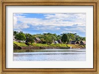 Framed Houses along a riverbank in the Amazon basin, Peru