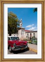 Framed 1957 Chevy car parked downtown, Mantanzas, Cuba