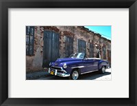 Framed Classic 1953 Chevy against worn stone wall, Cojimar, Havana, Cuba