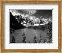 Framed Wenkchemna Peaks reflected in Moraine lake, Banff National Park, Alberta, Canada