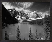 Framed Wenkchemna Peaks reflected in Moraine lake, Banff National Park, Alberta, Canada