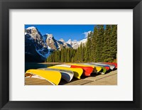 Framed Moraine Lake and rental canoes stacked, Banff National Park, Alberta, Canada