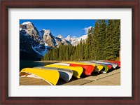 Framed Moraine Lake and rental canoes stacked, Banff National Park, Alberta, Canada