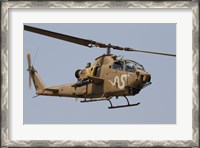 Framed AH-1S Tzefa helicopter in flight