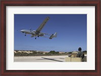 Framed IAI Heron Unmanned Aerial Vehicle takes off the runway