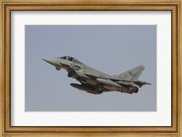 Framed Eurofighter Typhoon of the Italian Air Force taking off
