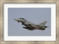 Framed Eurofighter Typhoon of the Italian Air Force taking off
