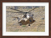 Framed CH-53 Yasur 2000 of the Israeli Air Force landing in the field