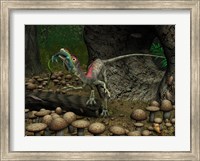 Framed Compsognathus prepares to swallow a small lizard