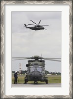 Framed German Army NH90 and its Predecessor, the CH-53 Sea Stallion