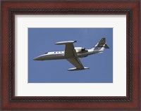 Framed United States Air Forces Europe C-21A Learjet in Flight over Germany