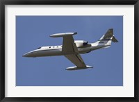 Framed United States Air Forces Europe C-21A Learjet in Flight over Germany