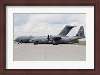 Framed C-130J Super Hercules with a C-17 Globemaster