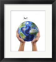 Framed Man's Hands Holding the Planet Earth, with a Jet Aircraft Flying Above