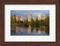 Framed Apartments reflected in Vanier Park Pond, Vancouver, British Columbia, Canada