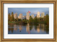 Framed Apartments reflected in Vanier Park Pond, Vancouver, British Columbia, Canada