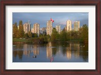 Framed Apartments reflected in Vanier Park Pond, Vancouver, British Columbia, Canada