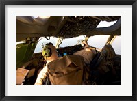 Framed US Army Pilots in-Flight in the Cockpit of a C-17 Globemaster III during a Mission to Qatar