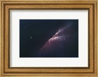 Framed Rays of Light from a Newborn Nebula