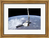 Framed SpaceX Dragon Cargo Craft in the Grasp of the Canadarm2