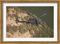 Framed AH-64D Apache Helicopter in Flight