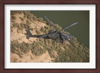 Framed AH-64D Apache Helicopter in Flight