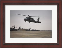 Framed UH-60 Black Hawk Taking off for a Mission Over Northern Iraq