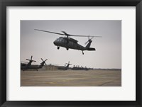 Framed UH-60 Black Hawk Taking off for a Mission Over Northern Iraq