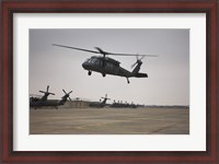 Framed UH-60 Black Hawk Taking off for a Mission Over Northern Iraq