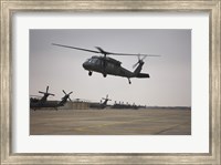 Framed UH-60 Black Hawk Taking off for a Mission Over Northern Iraq