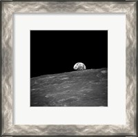 Framed first photograph taken by humans of Earthrise during Apollo 8.